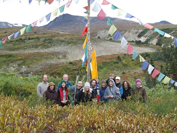Sangha members on Montana Mountain in 2007 after prayer flag and banner raising and smoke offering. Land there was donated to His Holiness the Karmapa in the 1970's