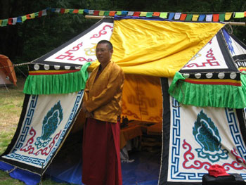 Sakya Monastery abbot Khenpo Jampa la in front of Head Lama tent at Gold Basin Campground in western Washington.