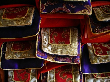 Brocade-wrapped sacred texts.