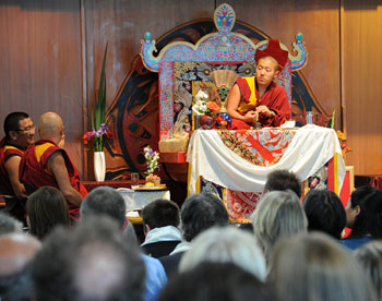 Kagyu Sukha Chöling's newly completed Meditation Center in Ashland, Oregon.  Wetland and wildlife pond are in foreground.  Main entry to the building is at left.
