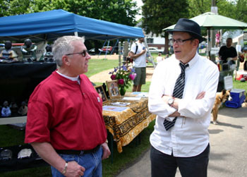 Doug Waddington, left, Superintendent of Washington Correctional Center, and Kevin Griffin, Dharma teacher and author, visited the Portland Buddhist Festival in Colonel Summer's Park.