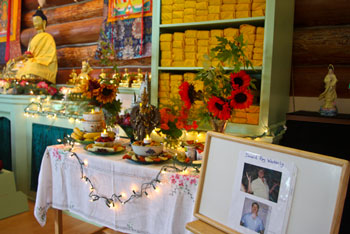 At Sravasti Abbey in Newport, Washington, a puja offering after Don Wackerly's death.  Photos of Don are at right.
